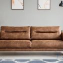 How does leather upholstery contribute to the luxurious appeal in homes